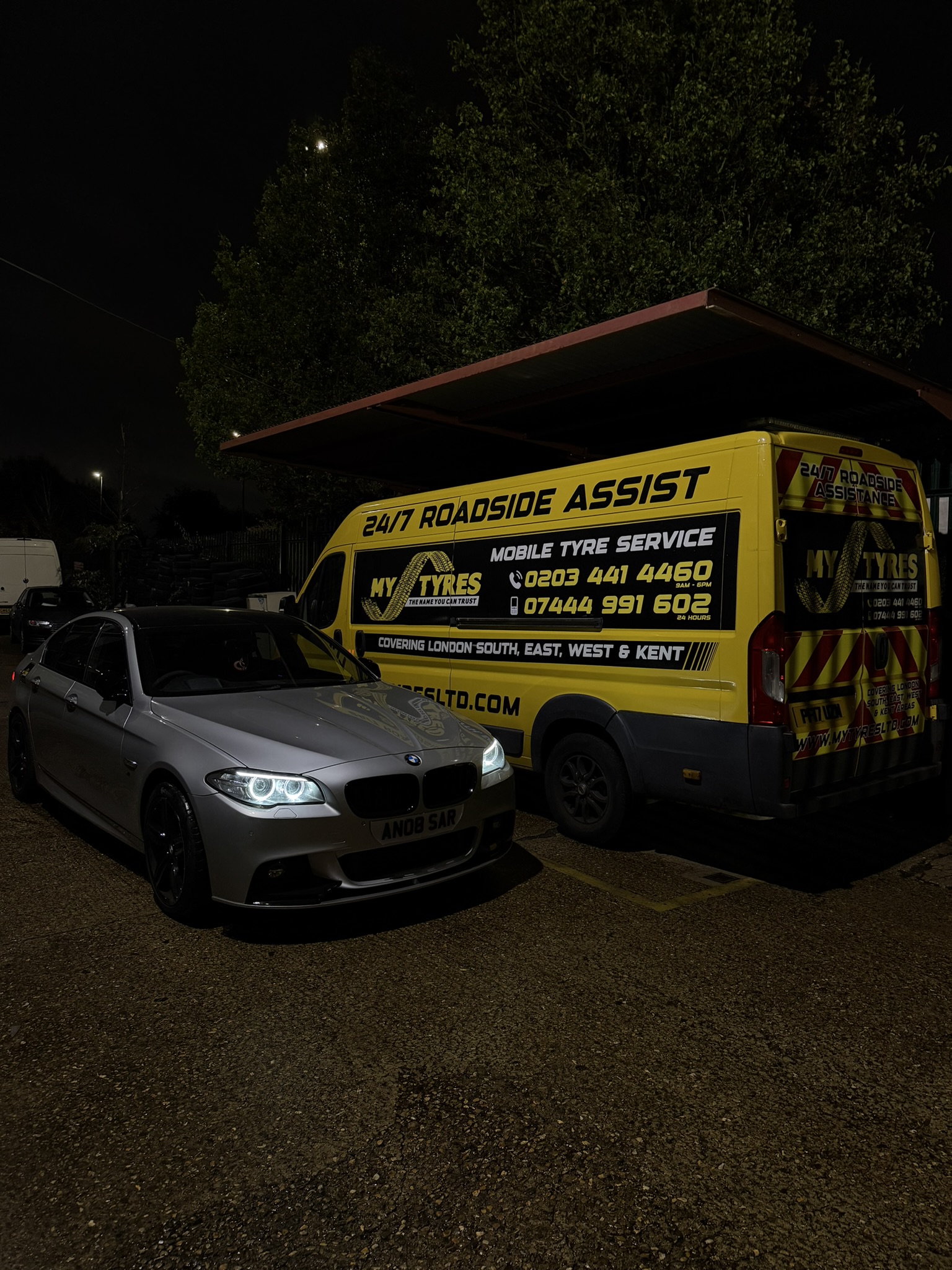 Technician checking wheels and final safety checks